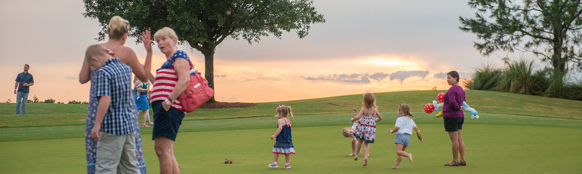 family playing in field