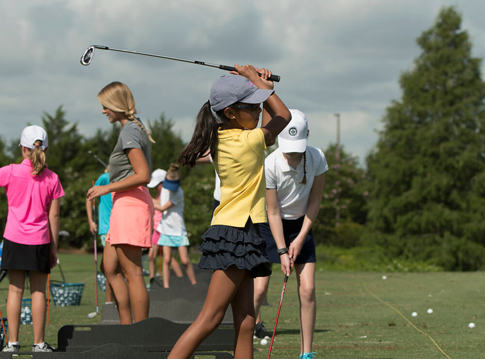 kid golfing