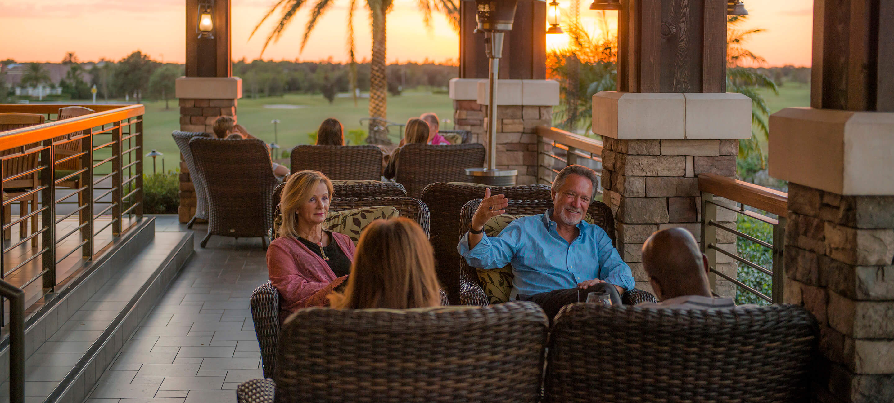 Couples on the porch at sunset